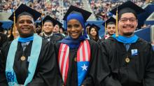 Three students celebrating CUNY SPS commencement