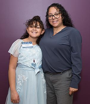 CUNY SPS scholarship recipient Jocelyn Nieves with her daughter.