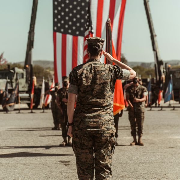 U.S. Marine Corps Lt. Col. Carrie E. Stocker renders a salute during the redesignation of 1st Transportation Support Battalion and deactivation of Landing Support Company and Support Company, 1st Transportation Support Battalion, on Camp Pendleton, California, Apr. 2, 2021. 